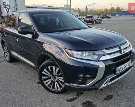 Синий Мицубиси Аутлендер, объемом двигателя 2.4 л и пробегом 106 тыс. км за 16500 $, фото 3 на Automoto.ua