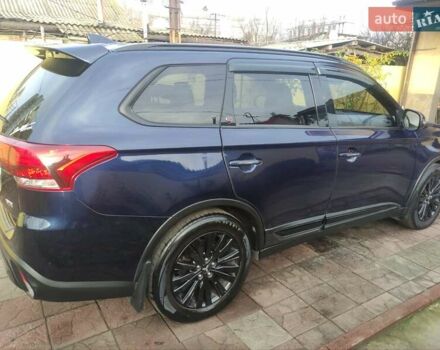 Синий Мицубиси Аутлендер, объемом двигателя 2.36 л и пробегом 112 тыс. км за 17800 $, фото 20 на Automoto.ua