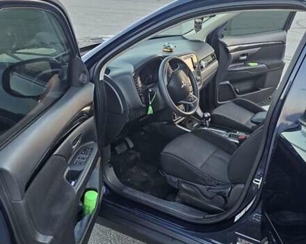 Синий Мицубиси Аутлендер, объемом двигателя 2.4 л и пробегом 106 тыс. км за 16500 $, фото 15 на Automoto.ua