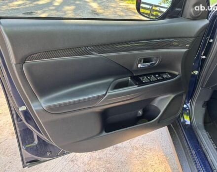 Синий Мицубиси Аутлендер, объемом двигателя 2.4 л и пробегом 75 тыс. км за 15990 $, фото 8 на Automoto.ua