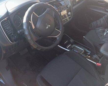 Синий Мицубиси Аутлендер, объемом двигателя 2 л и пробегом 21 тыс. км за 23600 $, фото 3 на Automoto.ua