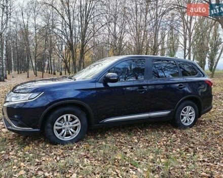 Синий Мицубиси Аутлендер, объемом двигателя 2 л и пробегом 68 тыс. км за 22000 $, фото 5 на Automoto.ua