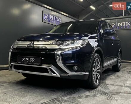 Синий Мицубиси Аутлендер, объемом двигателя 2 л и пробегом 62 тыс. км за 20500 $, фото 6 на Automoto.ua