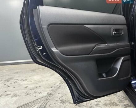 Синий Мицубиси Аутлендер, объемом двигателя 2 л и пробегом 62 тыс. км за 20500 $, фото 3 на Automoto.ua