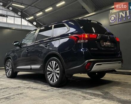 Синий Мицубиси Аутлендер, объемом двигателя 2 л и пробегом 62 тыс. км за 20500 $, фото 12 на Automoto.ua