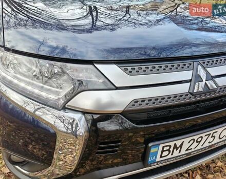 Синий Мицубиси Аутлендер, объемом двигателя 2 л и пробегом 68 тыс. км за 22000 $, фото 25 на Automoto.ua