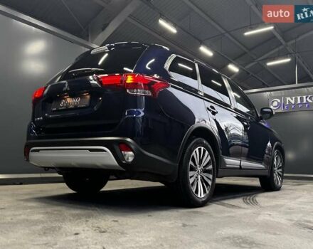 Синий Мицубиси Аутлендер, объемом двигателя 2 л и пробегом 62 тыс. км за 20500 $, фото 1 на Automoto.ua