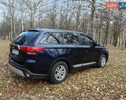 Синий Мицубиси Аутлендер, объемом двигателя 2 л и пробегом 68 тыс. км за 22000 $, фото 14 на Automoto.ua