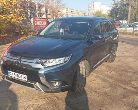 Синий Мицубиси Аутлендер, объемом двигателя 2 л и пробегом 21 тыс. км за 23600 $, фото 4 на Automoto.ua