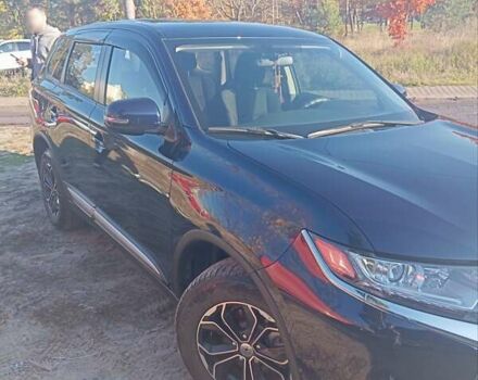 Синий Мицубиси Аутлендер, объемом двигателя 2 л и пробегом 21 тыс. км за 23600 $, фото 2 на Automoto.ua