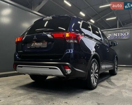 Синий Мицубиси Аутлендер, объемом двигателя 2 л и пробегом 62 тыс. км за 20500 $, фото 16 на Automoto.ua