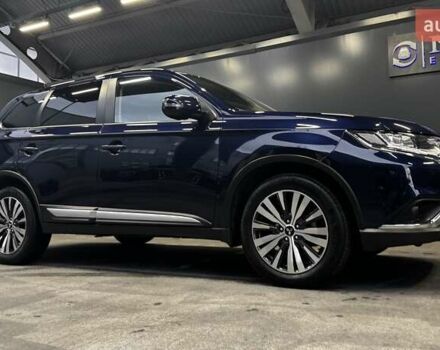 Синий Мицубиси Аутлендер, объемом двигателя 2 л и пробегом 62 тыс. км за 20500 $, фото 2 на Automoto.ua