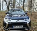 Синий Мицубиси Аутлендер, объемом двигателя 2 л и пробегом 68 тыс. км за 22000 $, фото 1 на Automoto.ua