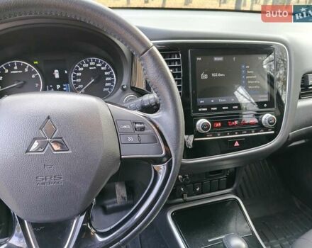Синий Мицубиси Аутлендер, объемом двигателя 2 л и пробегом 68 тыс. км за 22000 $, фото 30 на Automoto.ua