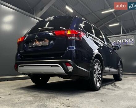 Синий Мицубиси Аутлендер, объемом двигателя 2 л и пробегом 62 тыс. км за 20500 $, фото 17 на Automoto.ua