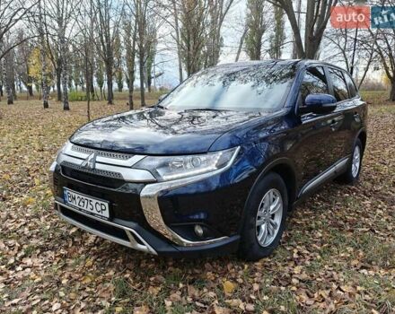 Синий Мицубиси Аутлендер, объемом двигателя 2 л и пробегом 68 тыс. км за 22000 $, фото 6 на Automoto.ua