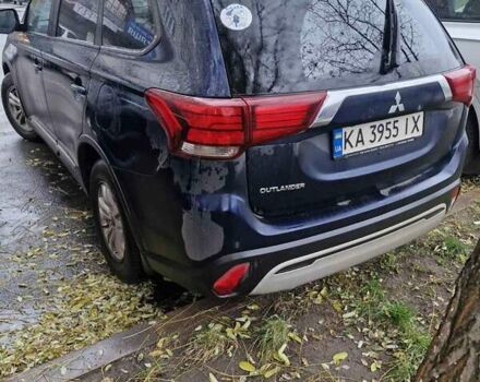 Синий Мицубиси Аутлендер, объемом двигателя 2 л и пробегом 73 тыс. км за 28500 $, фото 1 на Automoto.ua