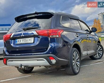 Синій Міцубісі Аутлендер, об'ємом двигуна 2.36 л та пробігом 76 тис. км за 24700 $, фото 3 на Automoto.ua