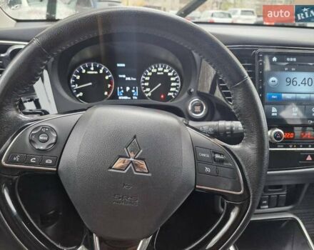 Синий Мицубиси Аутлендер, объемом двигателя 2 л и пробегом 73 тыс. км за 28500 $, фото 4 на Automoto.ua