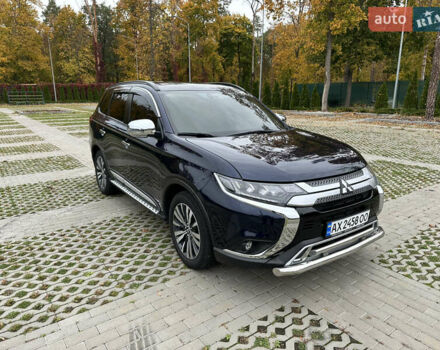 Синий Мицубиси Аутлендер, объемом двигателя 2.36 л и пробегом 47 тыс. км за 19500 $, фото 4 на Automoto.ua