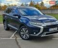 Синій Міцубісі Аутлендер, об'ємом двигуна 2.36 л та пробігом 76 тис. км за 24700 $, фото 1 на Automoto.ua