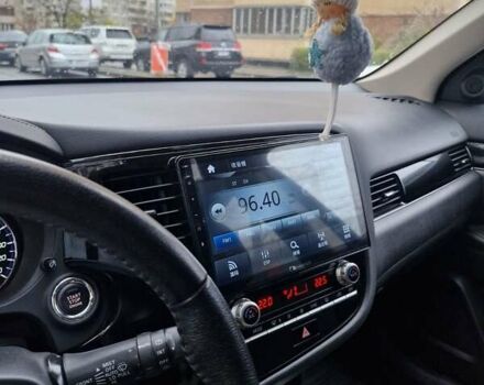 Синий Мицубиси Аутлендер, объемом двигателя 2 л и пробегом 73 тыс. км за 28500 $, фото 12 на Automoto.ua