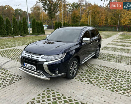 Синий Мицубиси Аутлендер, объемом двигателя 2.36 л и пробегом 47 тыс. км за 19500 $, фото 3 на Automoto.ua