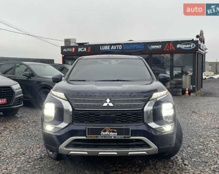 Синий Мицубиси Аутлендер, объемом двигателя 2.5 л и пробегом 84 тыс. км за 25500 $, фото 2 на Automoto.ua