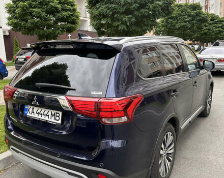 Синий Мицубиси Аутлендер, объемом двигателя 2.36 л и пробегом 47 тыс. км за 34000 $, фото 2 на Automoto.ua