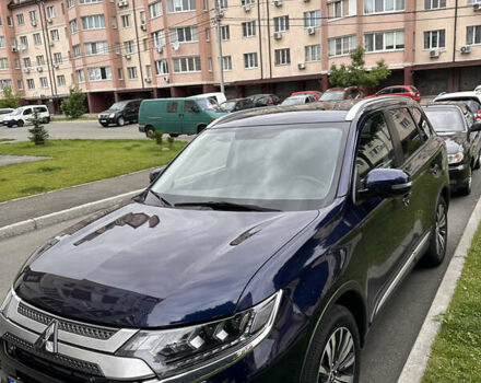 Синий Мицубиси Аутлендер, объемом двигателя 2.36 л и пробегом 47 тыс. км за 34000 $, фото 4 на Automoto.ua