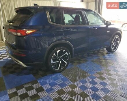 Синий Мицубиси Аутлендер, объемом двигателя 2.49 л и пробегом 88 тыс. км за 19500 $, фото 3 на Automoto.ua