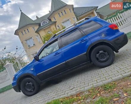 Синій Міцубісі Аутлендер, об'ємом двигуна 2.4 л та пробігом 234 тис. км за 4100 $, фото 1 на Automoto.ua