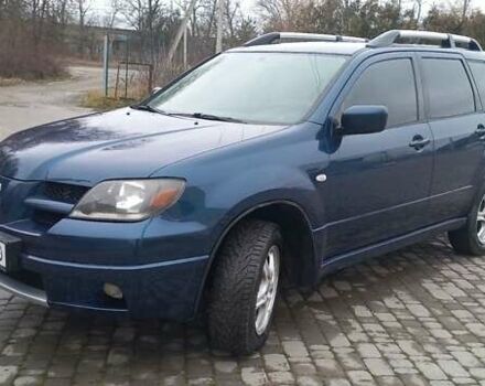 Синій Міцубісі Аутлендер, об'ємом двигуна 2 л та пробігом 400 тис. км за 4400 $, фото 1 на Automoto.ua