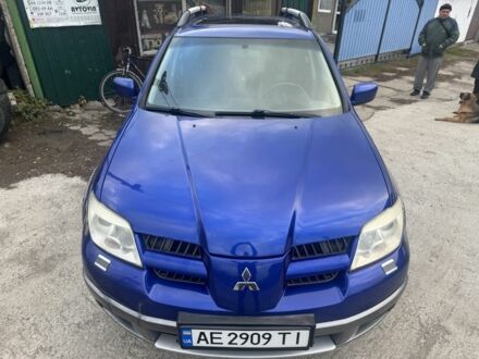 Синій Міцубісі Аутлендер, об'ємом двигуна 2.4 л та пробігом 220 тис. км за 4500 $, фото 1 на Automoto.ua