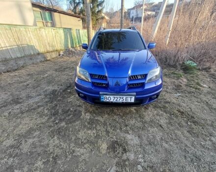 Синій Міцубісі Аутлендер, об'ємом двигуна 2 л та пробігом 238 тис. км за 5800 $, фото 1 на Automoto.ua