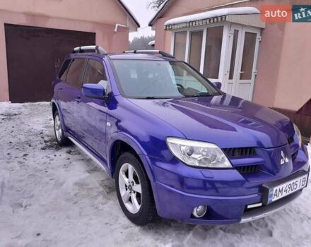Синій Міцубісі Аутлендер, об'ємом двигуна 2.38 л та пробігом 246 тис. км за 6800 $, фото 1 на Automoto.ua