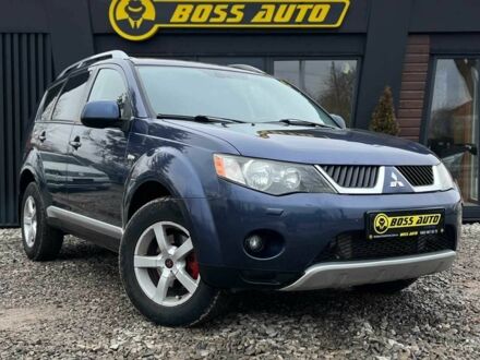 Синий Мицубиси Аутлендер, объемом двигателя 2 л и пробегом 248 тыс. км за 7900 $, фото 1 на Automoto.ua