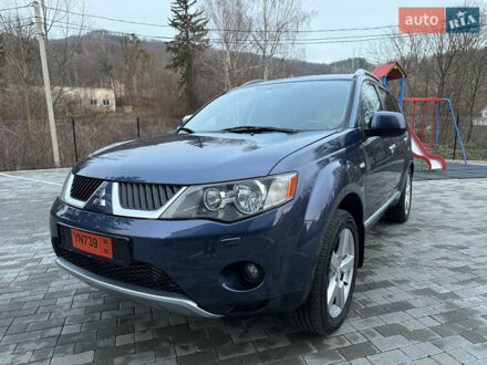 Синий Мицубиси Аутлендер, объемом двигателя 2 л и пробегом 228 тыс. км за 8888 $, фото 1 на Automoto.ua