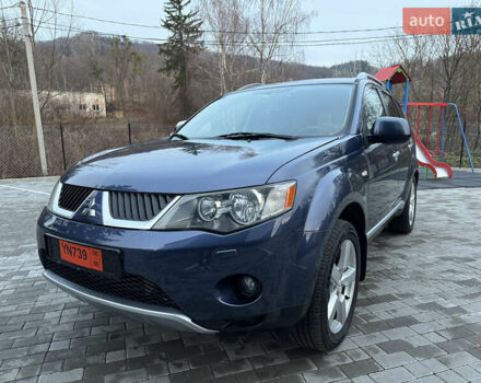 Синий Мицубиси Аутлендер, объемом двигателя 2 л и пробегом 228 тыс. км за 8888 $, фото 1 на Automoto.ua