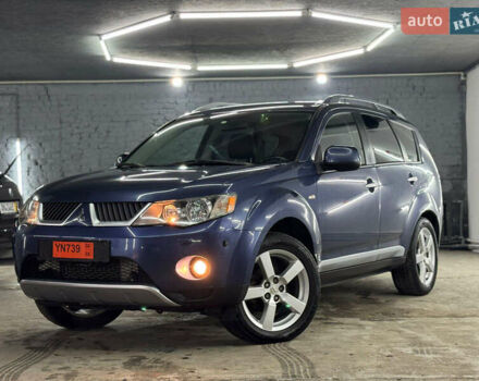 Синий Мицубиси Аутлендер, объемом двигателя 2 л и пробегом 228 тыс. км за 7999 $, фото 1 на Automoto.ua