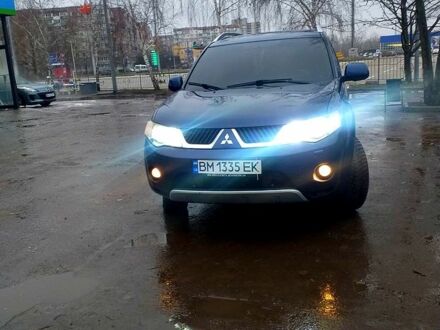 Мицубиси Аутлендер 2007 в Сумах на Automoto.ua Синий Мицубиси Аутлендер, объемом двигателя 2 л и пробегом 293 тыс. км за 8300 $, фото 1 на Automoto.ua