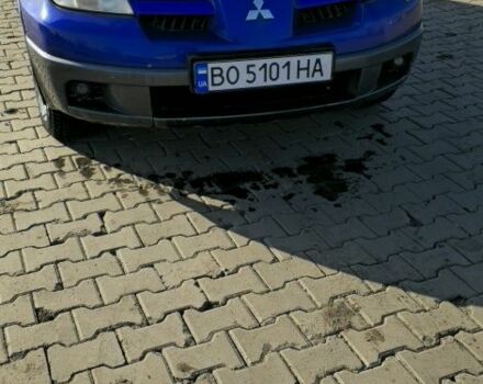 Синий Мицубиси Аутлендер, объемом двигателя 2 л и пробегом 300 тыс. км за 4300 $, фото 1 на Automoto.ua