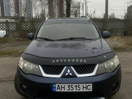 Синий Мицубиси Аутлендер, объемом двигателя 2.4 л и пробегом 500 тыс. км за 6500 $, фото 1 на Automoto.ua