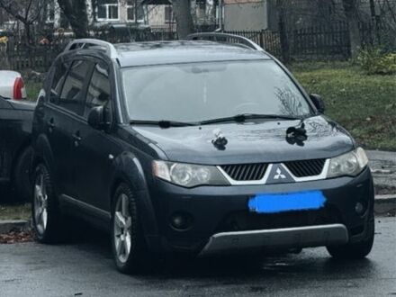 Синий Мицубиси Аутлендер, объемом двигателя 2 л и пробегом 388 тыс. км за 5000 $, фото 1 на Automoto.ua