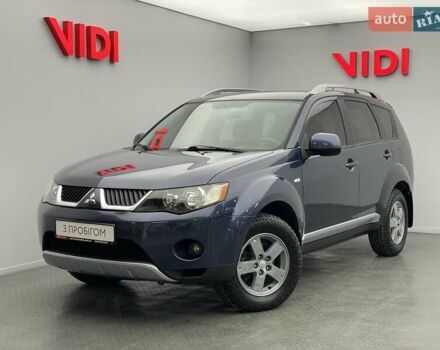 Синій Міцубісі Аутлендер, об'ємом двигуна 2.4 л та пробігом 126 тис. км за 10438 $, фото 1 на Automoto.ua