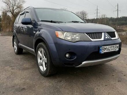 Синий Мицубиси Аутлендер, объемом двигателя 2.4 л и пробегом 211 тыс. км за 7800 $, фото 1 на Automoto.ua