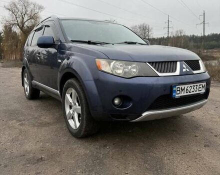 Синій Міцубісі Аутлендер, об'ємом двигуна 2.4 л та пробігом 211 тис. км за 7800 $, фото 1 на Automoto.ua