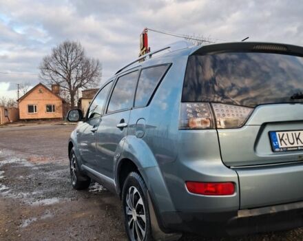 Синий Мицубиси Аутлендер, объемом двигателя 2 л и пробегом 600 тыс. км за 3500 $, фото 1 на Automoto.ua