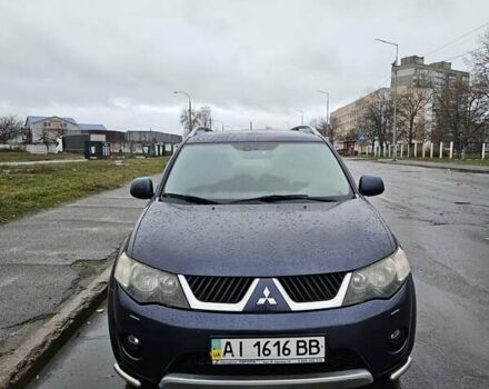 Синій Міцубісі Аутлендер, об'ємом двигуна 2.4 л та пробігом 282 тис. км за 10500 $, фото 1 на Automoto.ua