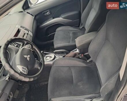 Синий Мицубиси Аутлендер, объемом двигателя 2.4 л и пробегом 162 тыс. км за 7500 $, фото 1 на Automoto.ua